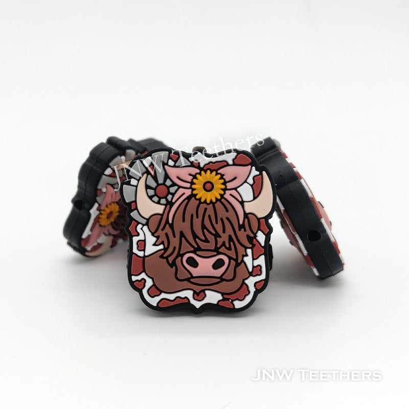 Perles focales de silicone de vache des Highlands