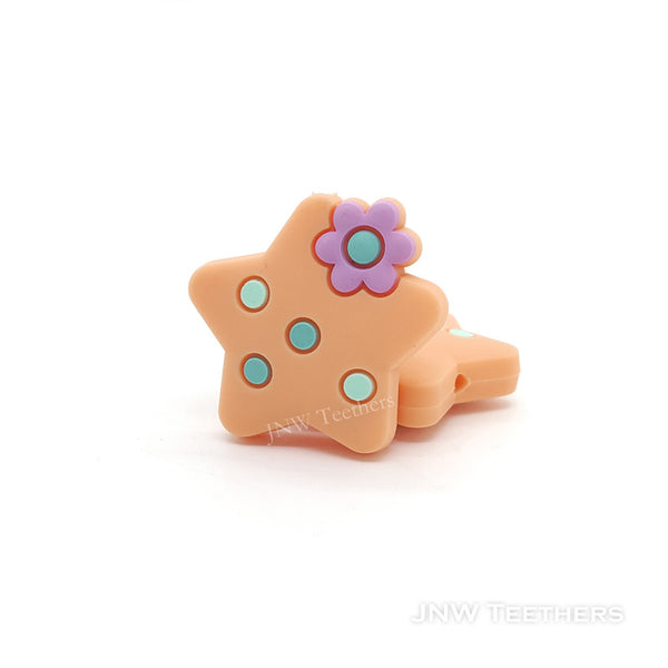 Star silicone focal beads peachy