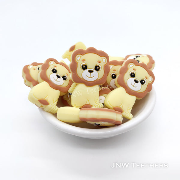 Lion silicone focal beads cream yellow