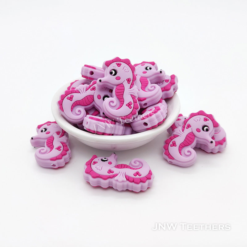 Perles focales en silicone hippocampe fuchsia