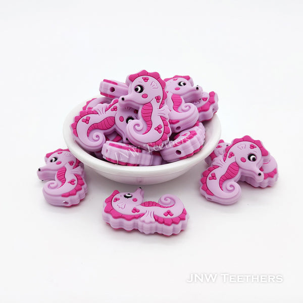 Perles focales en silicone hippocampe fuchsia