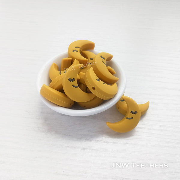 Sleeping moon silicone focal beads mustard