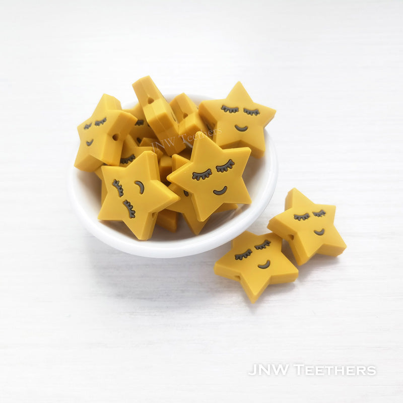 Sleeping star silicone focal beads mustard