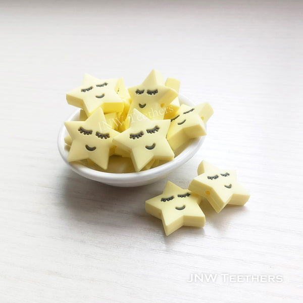 star silicone focal beads cream yellow