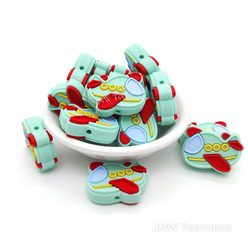 Mint airplane focal beads
