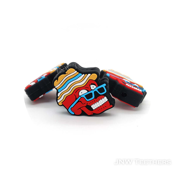 Red skull in blue glasses silicone focal beads
