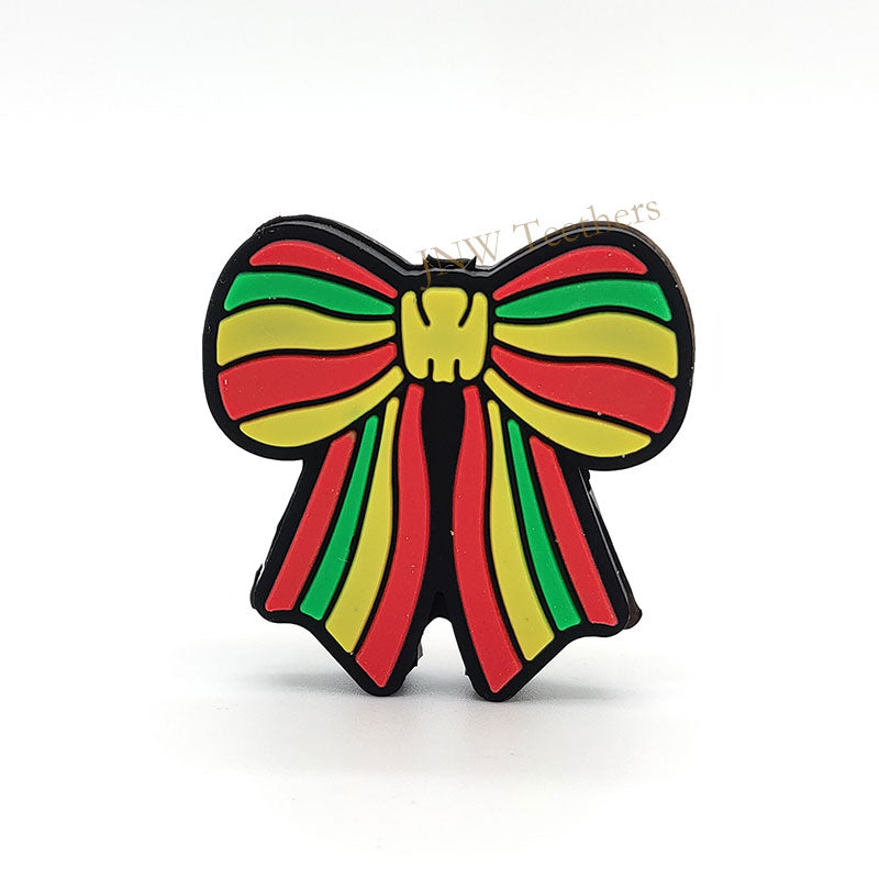 Bowtie with red yellow and green stripes silicone focal beads