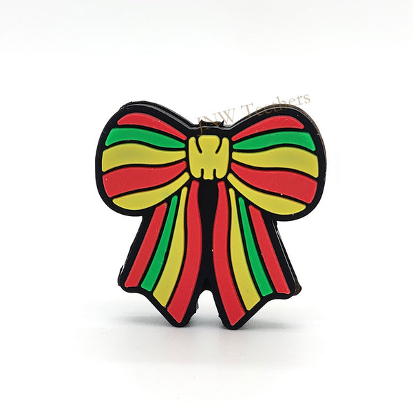 Bowtie with red yellow and green stripes silicone focal beads