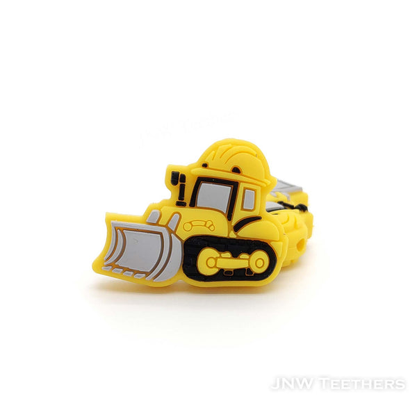 Yellow bulldozer silicone focal beads