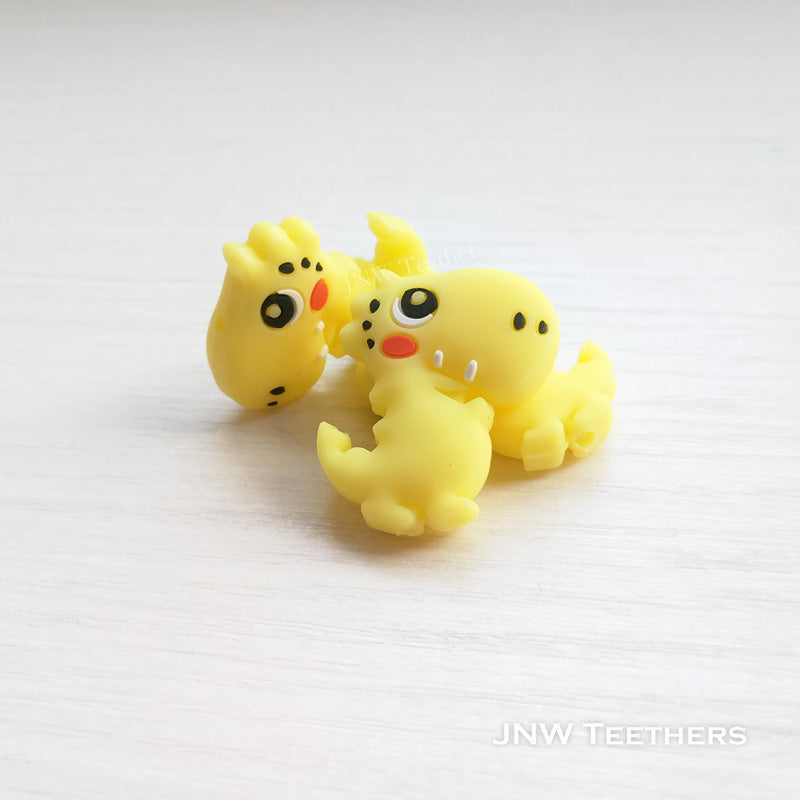 Dino silicone focal beads yellow