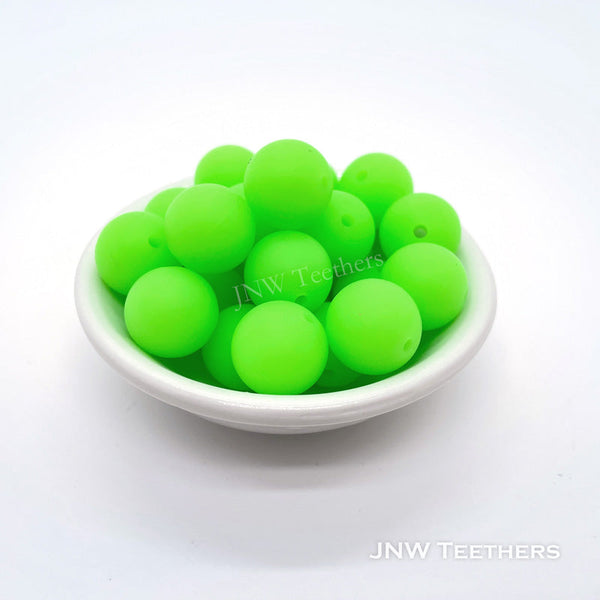 Glow in dark silicone round beads green