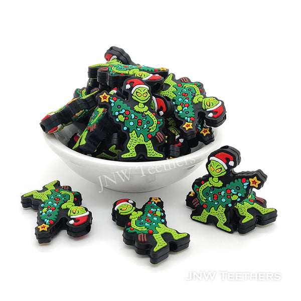 Grinc holding Chritmas tree silicone focal beads