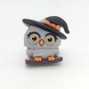 Light gray 3D witch owl silicone focal bead wearing a black-and-orange witch hat while perched on a branch