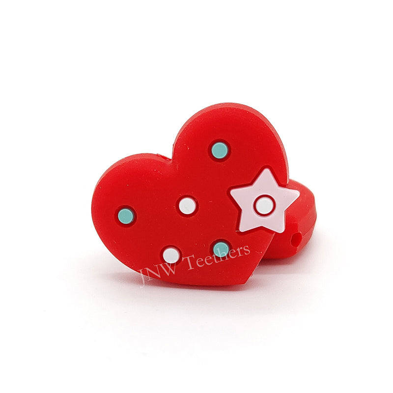 Heart with little star silicone focal beads red