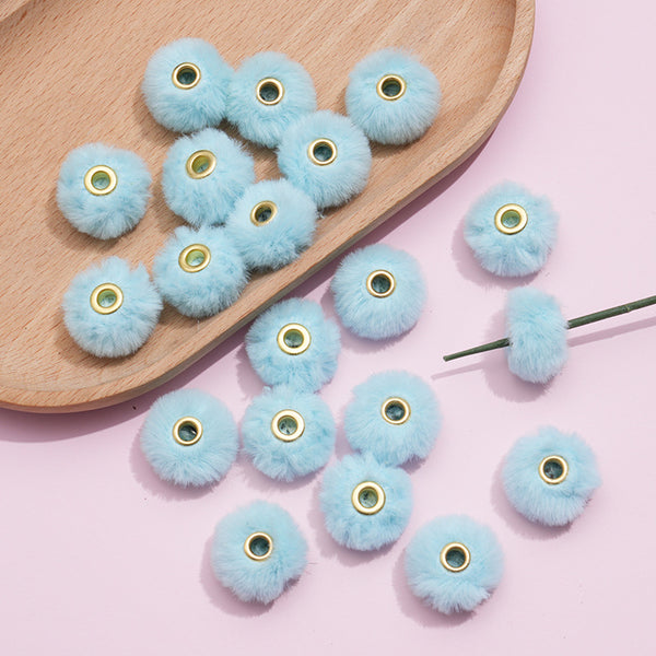 Faux fur poms with hole beads for crafing light blue