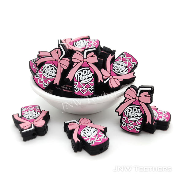 Pink bow-knot Dr. Peppe drink silicone focal beads