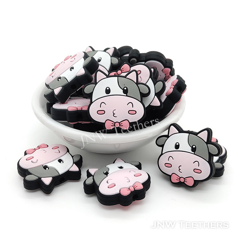 Pink bowknot cow silicone focal beads