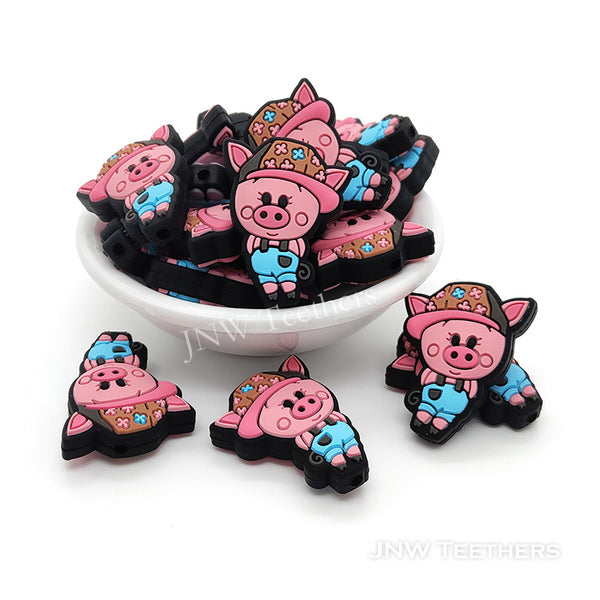 Pink piggy wearing cap silicone focal beads