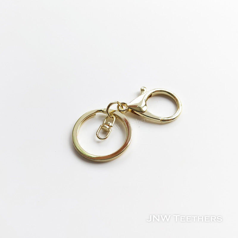 light gold plated metal kering with losbter clasp