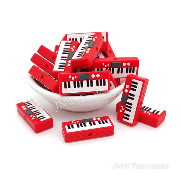 Red piano silicone focal beads