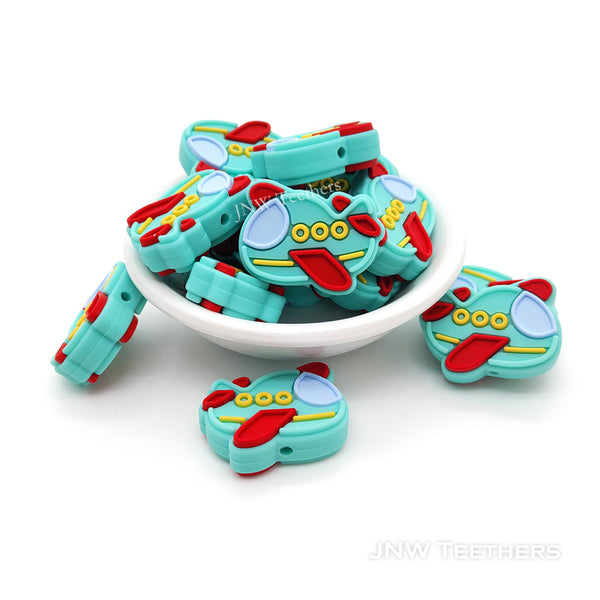 Turquoise airplane silicone focal beads
