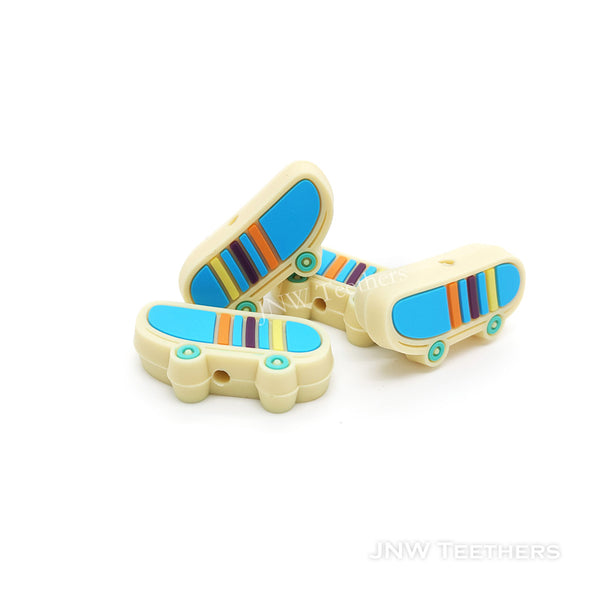 Skateboard silicone focal beads blue