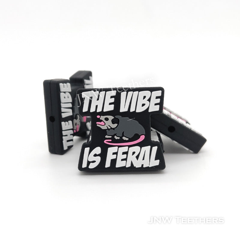 The vibe is feral possum silicone focal beads